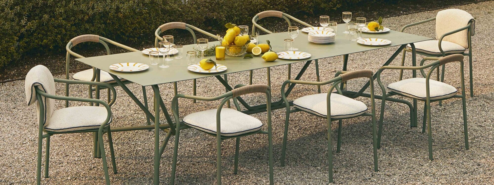 Image of sage green Unopiu Salò garden dining table and chairs
