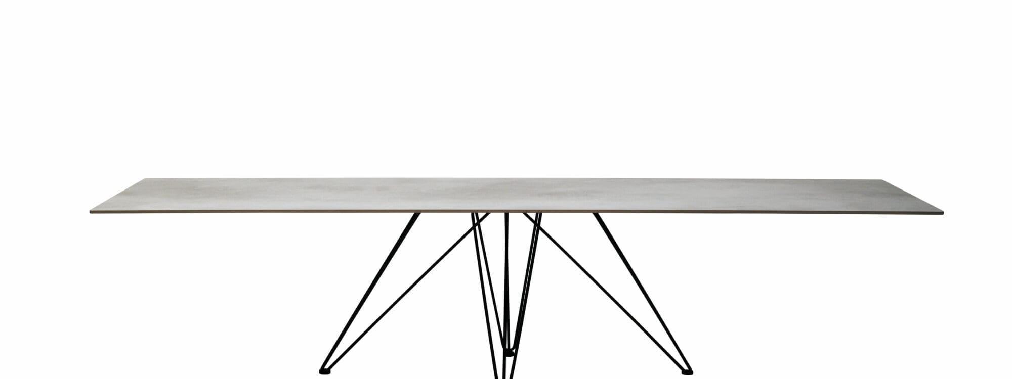 Studio image of rectangular Wire table with geometric base and luxurious ceramic table top by Joli