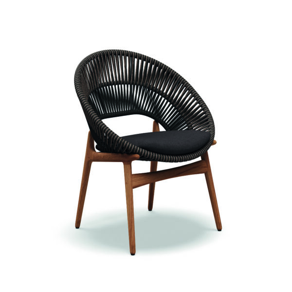Studio image of Gloster Bora luxury garden chair in sorrel wicker