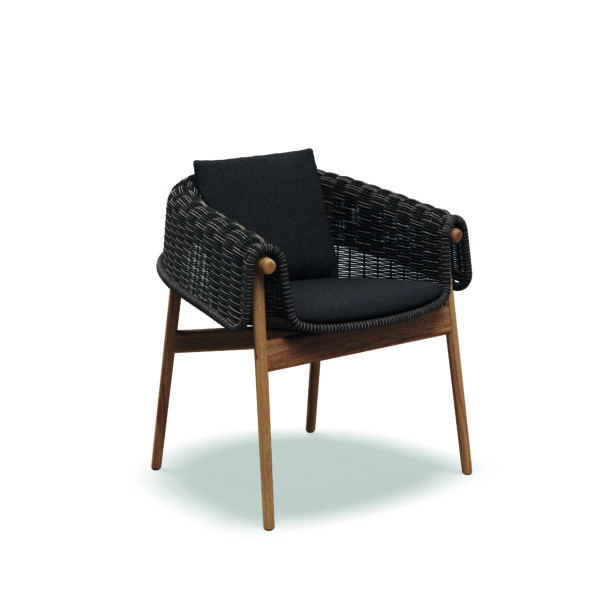 Studio image of Gloster Wrap dining chair in Umber wicker and teak