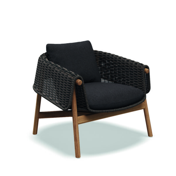 Studio image of Gloster Wrap lounge chair with Umber wicker seat
