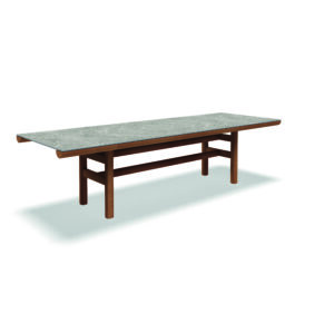 Studio image of large Gloster Rail teak dining table with Grigio ceramic top