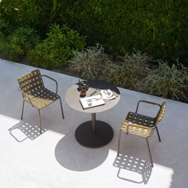 Image of RODA Erice garden chairs and Button bistro table in sun and shade of terrace
