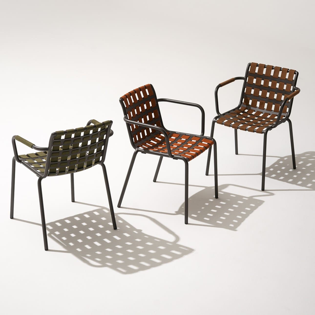 Studio image of 3 Erice garden chairs by RODA in different finishes