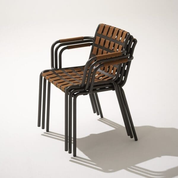 Studio image of stacked Erice luxury garden chairs by RODA