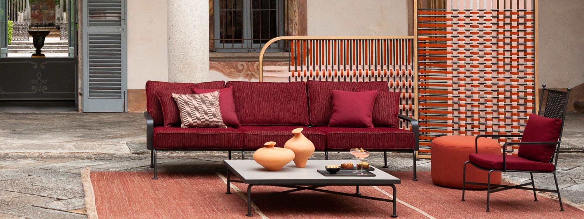Image of RODA Stresa 3 seat garden sofa and lounge chair, together with large coffee able in palacial Italian surroundings