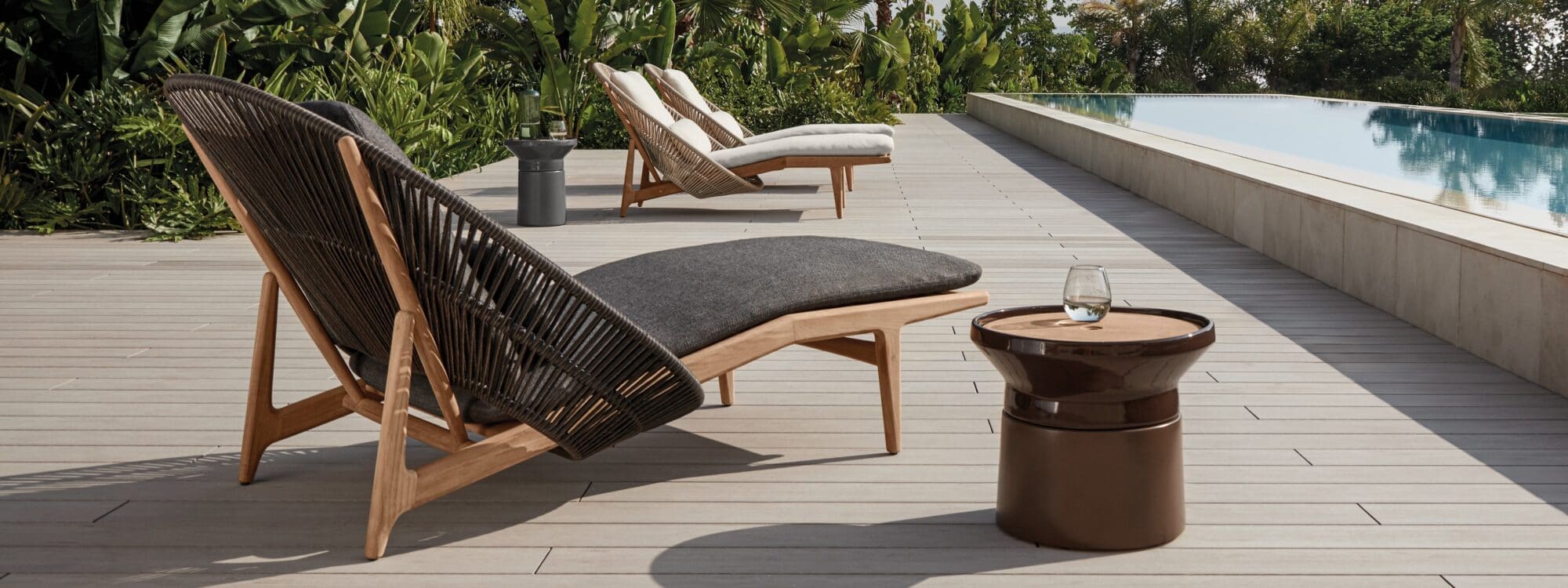 Image of Gloster Bora loungers oin sunny poolside