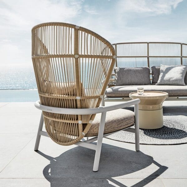 Image of detail of back of Gloster Fern aluminium lounge chair with high back