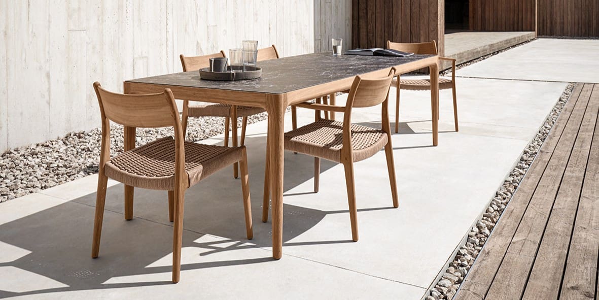 Image of Gloster Lima ceramic dining table with teak legs