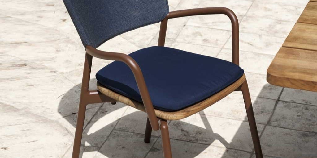 Image of RODA Piper armchair with rust frame and Navy Batyline