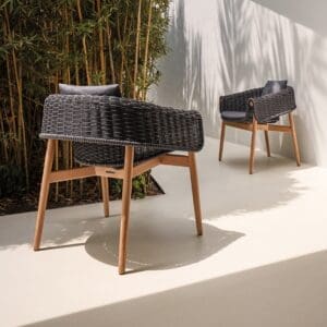 Image of pair of Gloster Wrap dining chairs in Umber wicker and teak