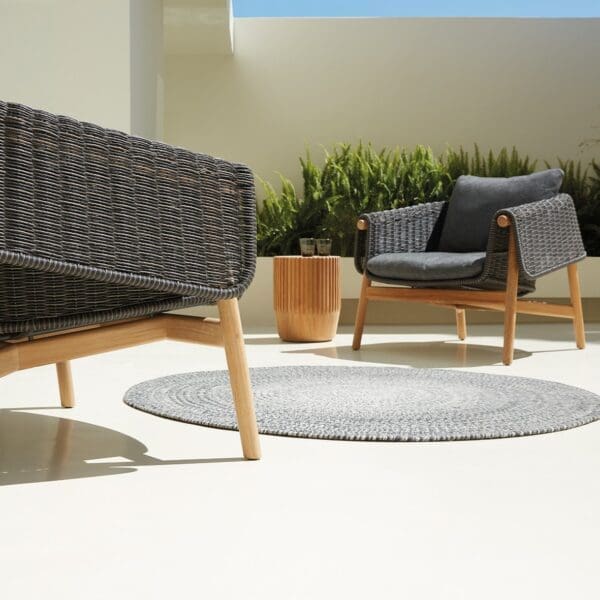 Image of Gloster Wrap lounge chairs in Umber wicker