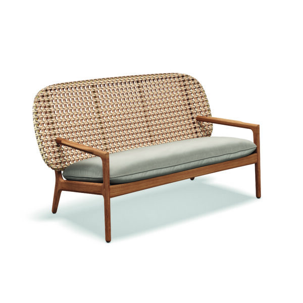 Studio image of Gloster Kay wicker sofa in harvest finish