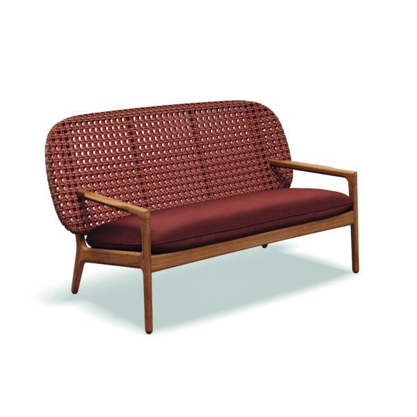 Studio image of Gloster Kay sofa in copper wicker with teak frame