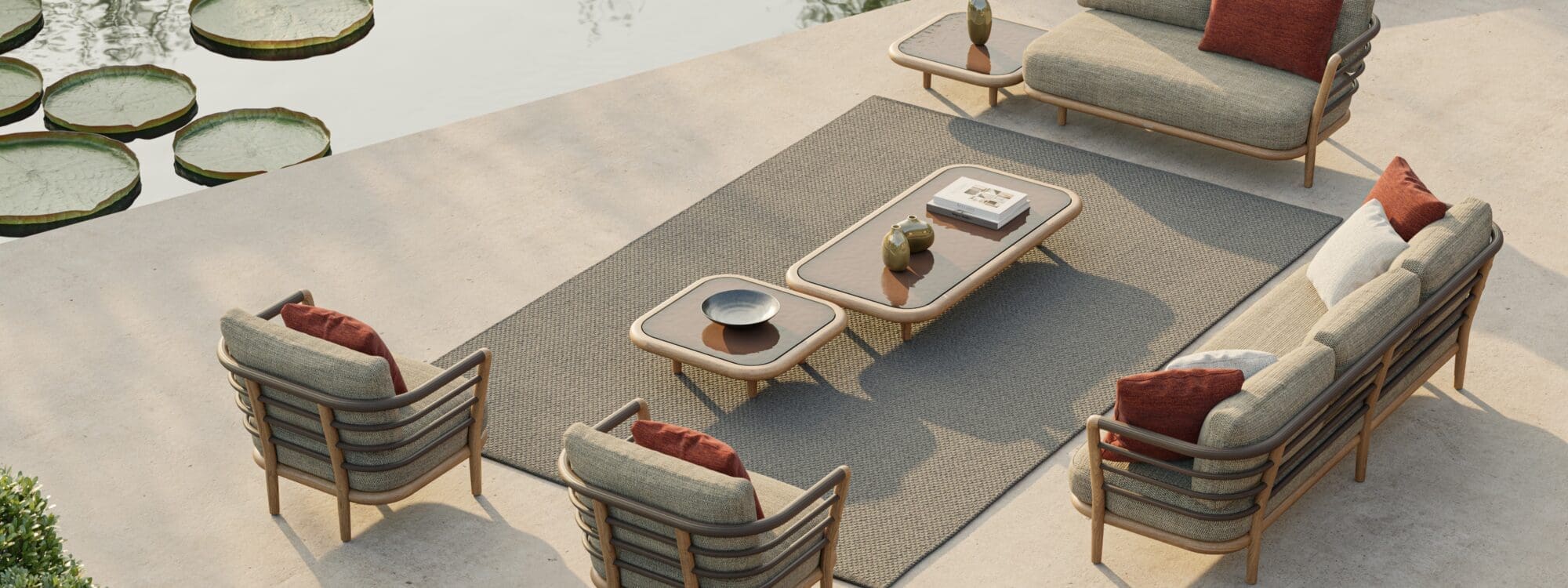 Image of Royal Botania Archy Lounge furniture next to still waters of a pool