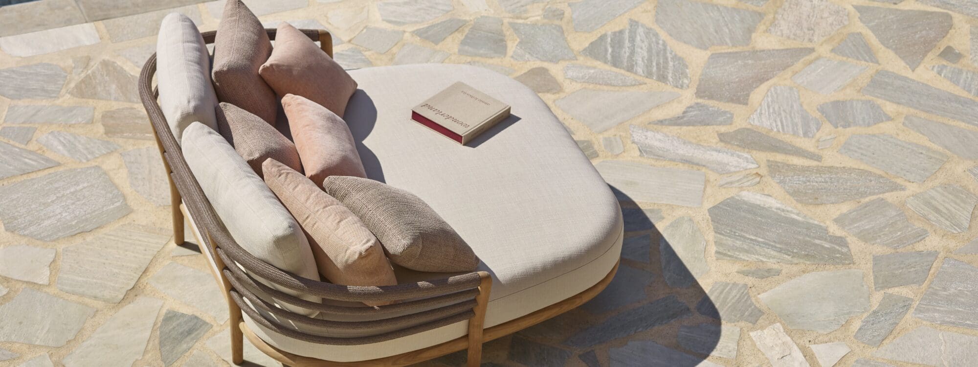 Image of Royal Botania Archy Lounge daybed on sunny poolside