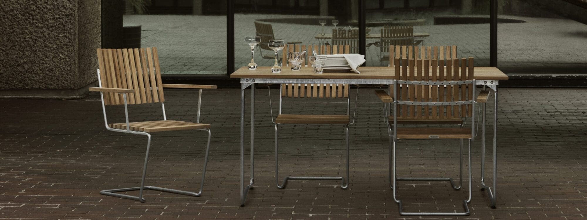 Image of Grythyttan Bovik furniture in brutalist concrete surroundings