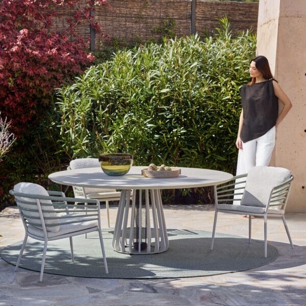 Image of Archy low dining chairs and Furniz heated garden table by Royal Botania