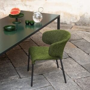Image of Double upholstered garden chair and Plein Air dining table in green wavy glass by RODA