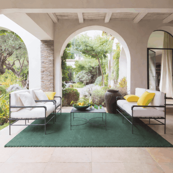 Image of Unopiu Toscana classical Italian garden sofa and lounge chairs on sheltered terrace